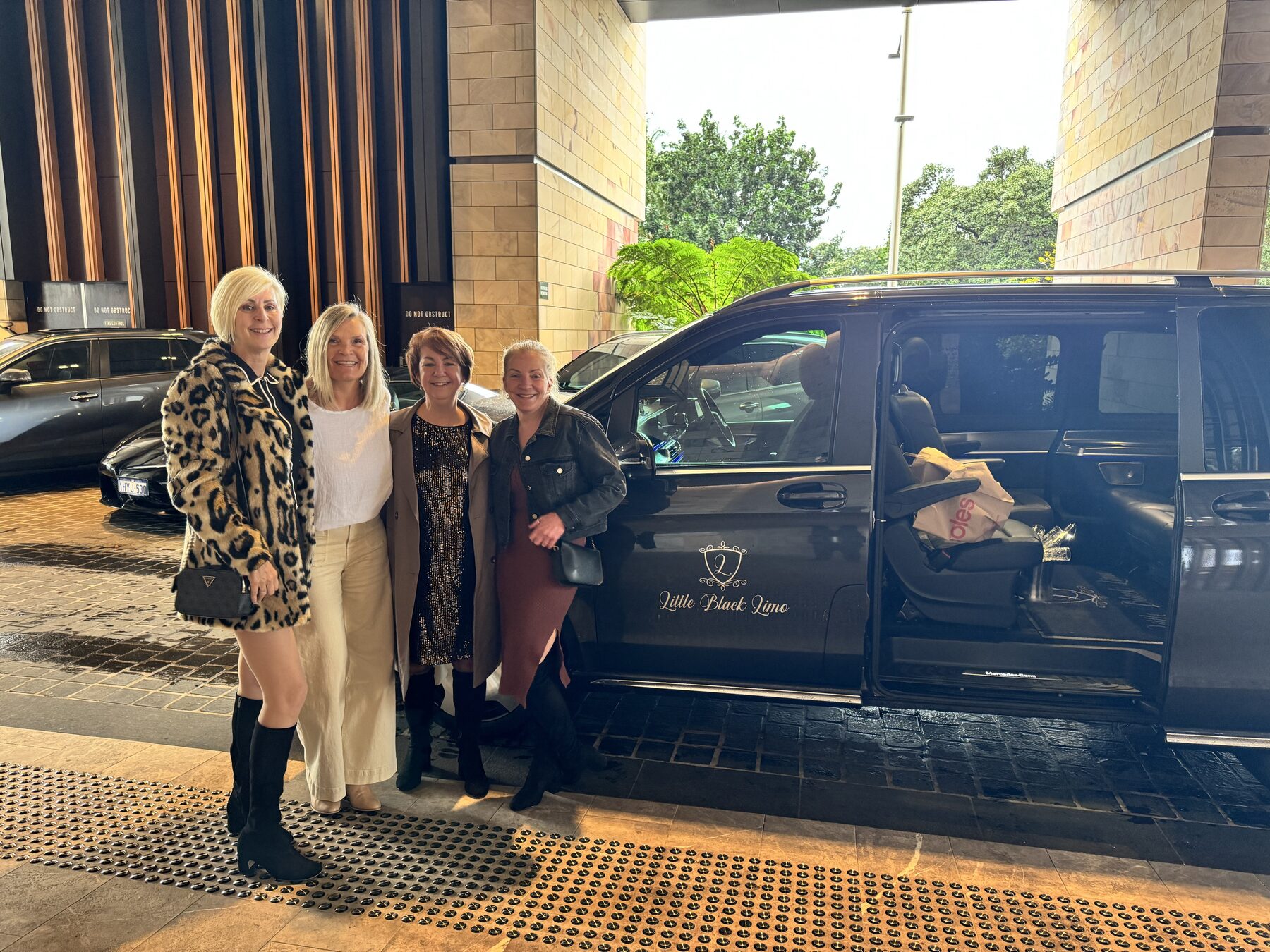 Group arriving at a hotel entrance